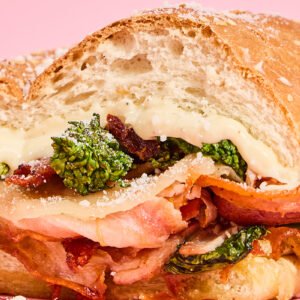 Porchetta & Sauerkraut, Crispy Onions, Swiss Cheese, Mustard Mayo